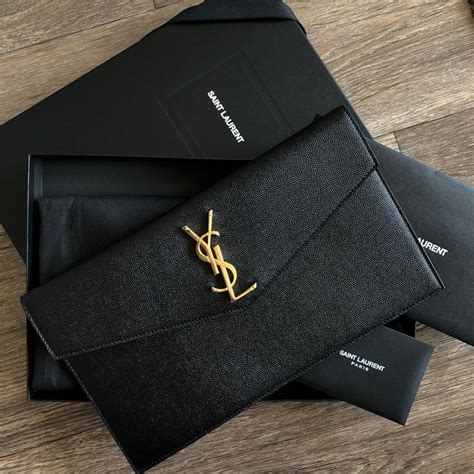 ysl uptown pouch saks|More.